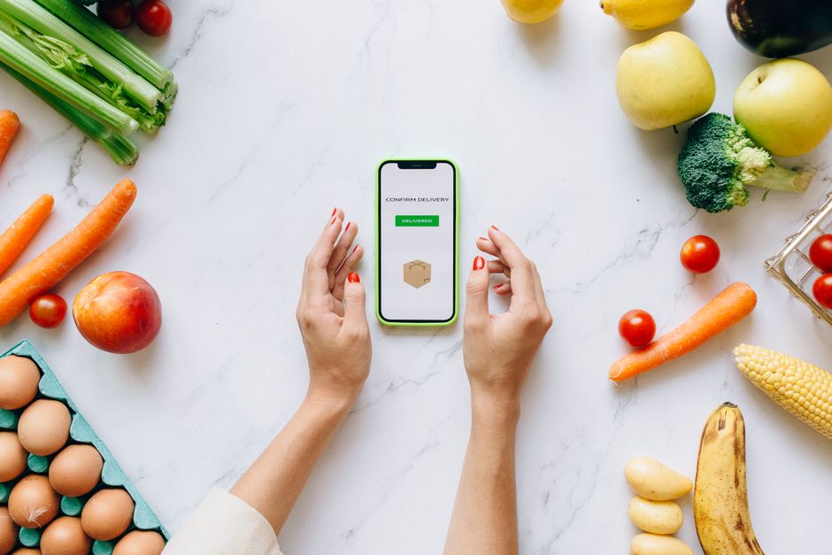 Person using a nutrition tracking app on a phone